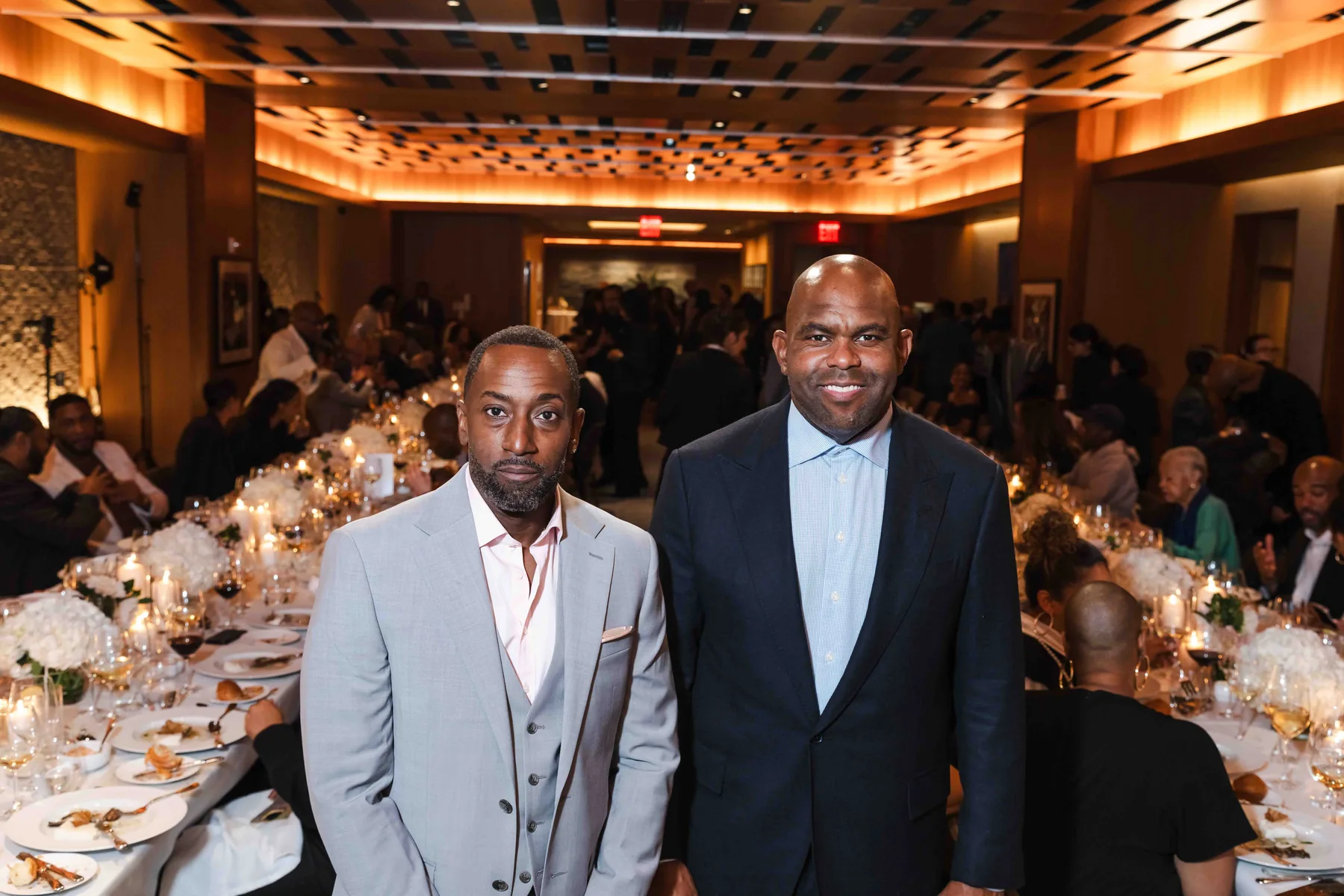 Guests by the long table, Collector X in New York