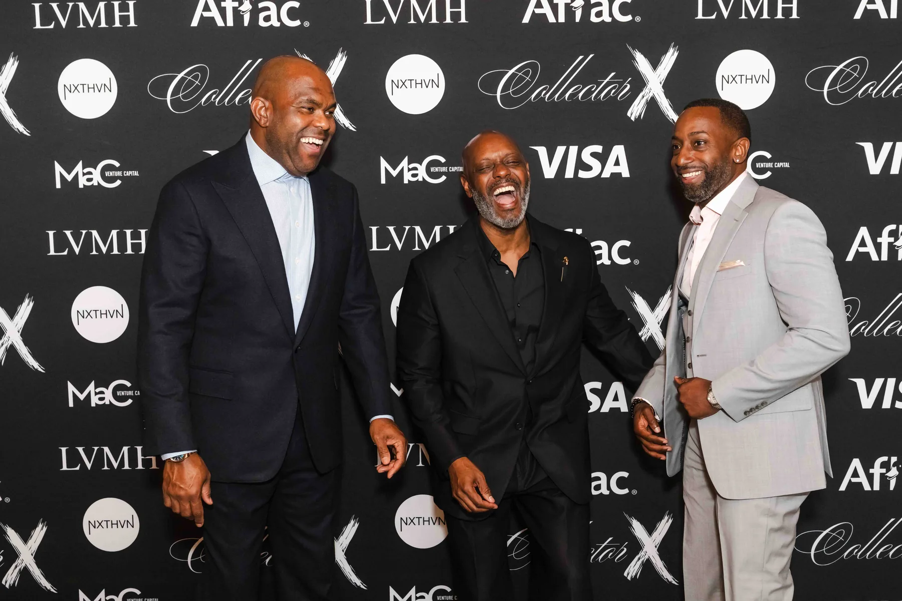 Laughing on the backdrop, Collector X in New York