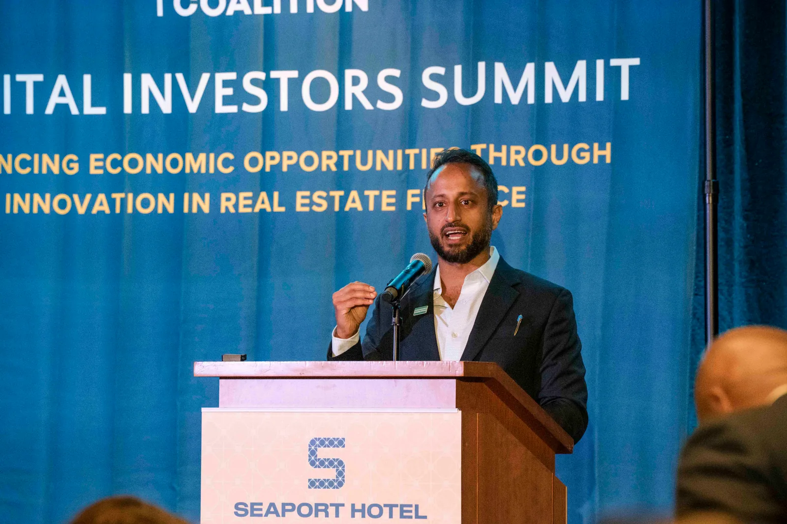 At the podium, TBC Capital Investors Summit