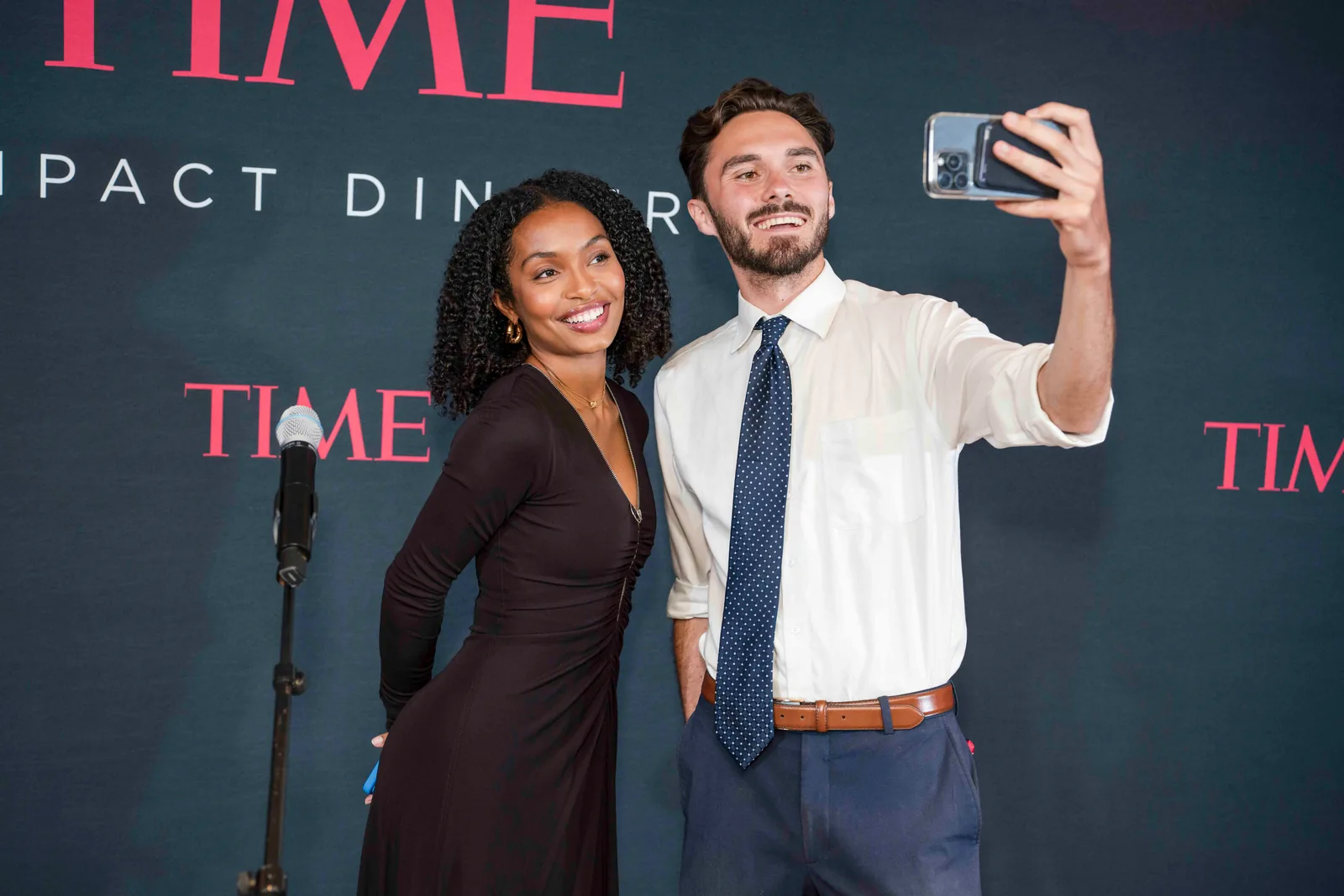 On the step and repeat, TIME Impact Dinner